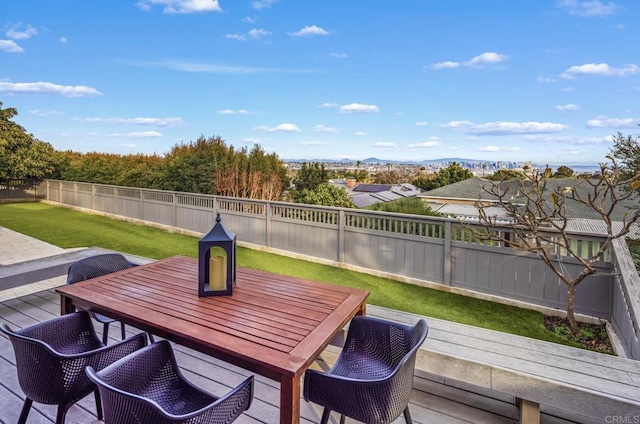 deck with outdoor dining space