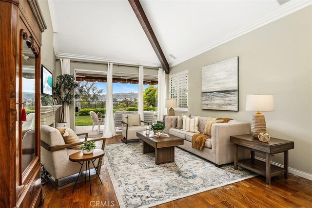 19 Rollins Pl, Laguna Niguel, CA 92677 - living room featuring wood finished floors, a fireplace, baseboards, and crown molding