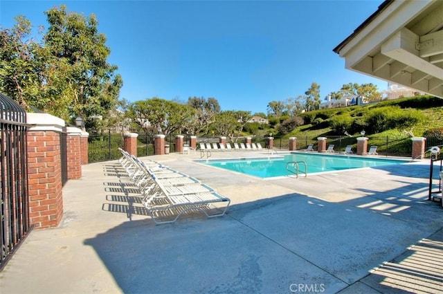 19 Rollins Pl, Laguna Niguel, CA 92677 - community pool featuring a patio area and fence