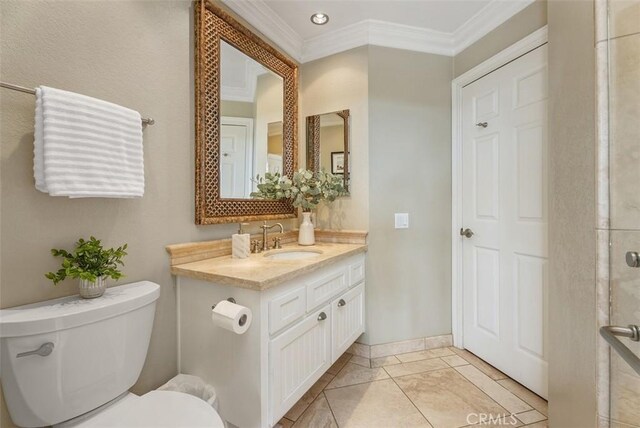 19 Rollins Pl, Laguna Niguel, CA 92677 - bathroom with toilet, crown molding, vanity, and baseboards