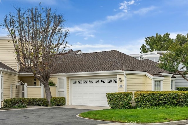 19 Rollins Pl, Laguna Niguel, CA 92677 - view of front of house with asphalt driveway, a garage, and a shingled roof