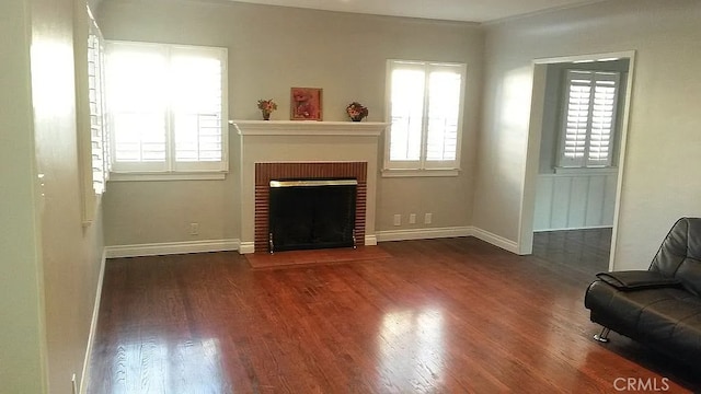 527 S Orchard Dr, Burbank, CA 91506 - living area featuring healthy amount of natural light, wood finished floors, and a fireplace