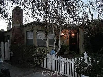 527 S Orchard Dr, Burbank, CA 91506 - view of home's exterior with a chimney