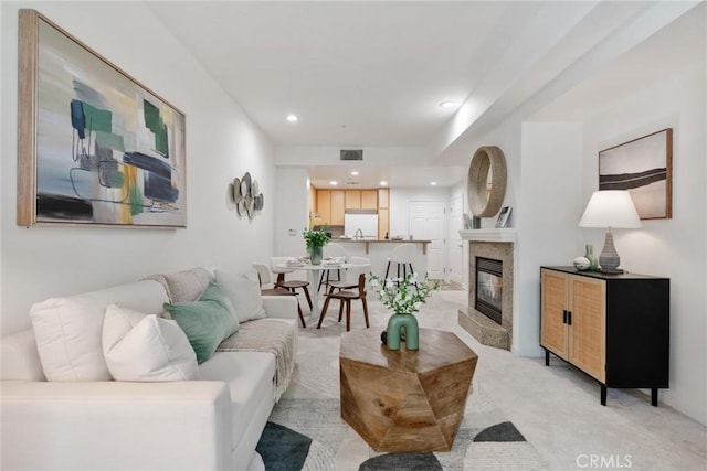 160 S Hudson Ave Unit 202, Pasadena, CA 91101 - living area featuring light carpet, a glass covered fireplace, and recessed lighting
