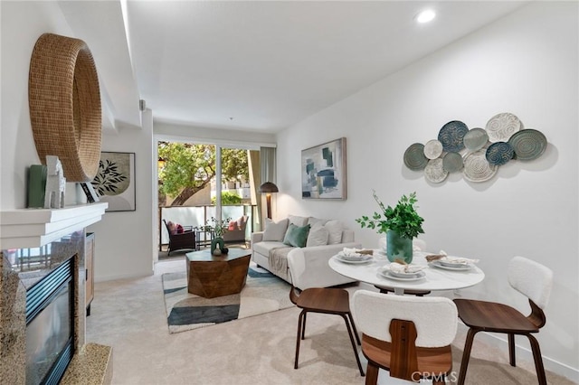 160 S Hudson Ave Unit 202, Pasadena, CA 91101 - living area with light carpet, a premium fireplace, baseboards, and recessed lighting