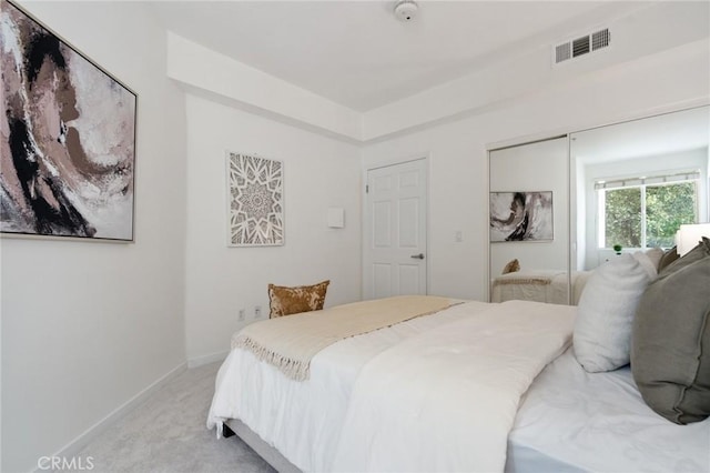 160 S Hudson Ave Unit 202, Pasadena, CA 91101 - bedroom featuring light colored carpet, a closet, and baseboards