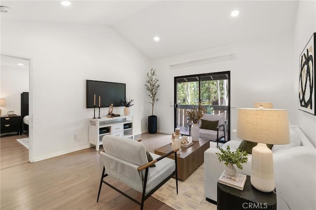 20702 El Toro Rd Unit 300, Lake Forest, CA 92630 - living room with vaulted ceiling, light wood-type flooring, recessed lighting, and baseboards