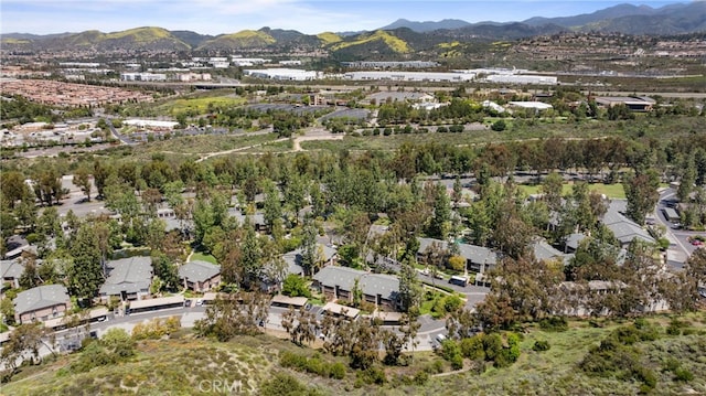 20702 El Toro Rd Unit 300, Lake Forest, CA 92630 - aerial view of property's location with a mountain backdrop and nearby suburban area