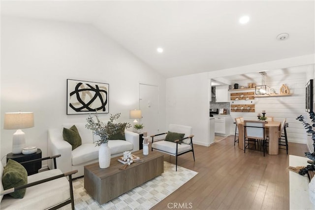 20702 El Toro Rd Unit 300, Lake Forest, CA 92630 - living area featuring vaulted ceiling, light wood-style flooring, and recessed lighting