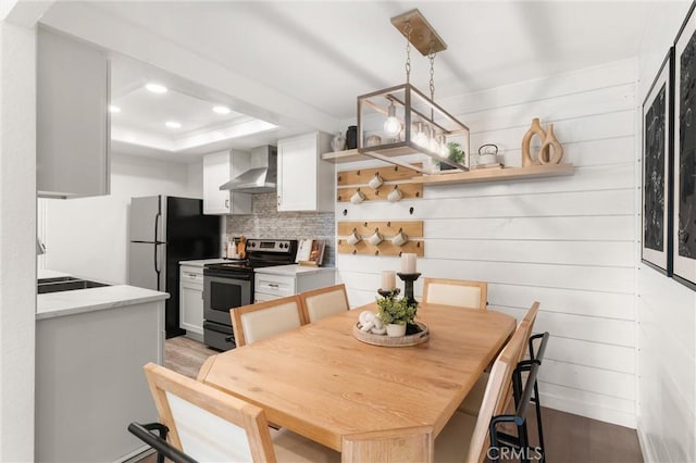 20702 El Toro Rd Unit 300, Lake Forest, CA 92630 - dining area featuring light wood-type flooring, recessed lighting, and a raised ceiling