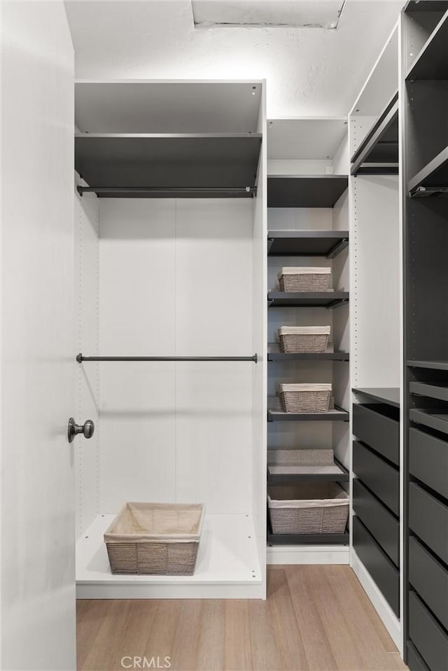 20702 El Toro Rd Unit 300, Lake Forest, CA 92630 - walk in closet with wood finished floors