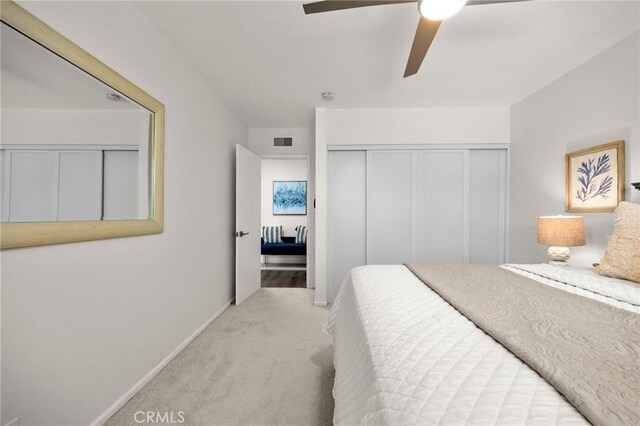 196 Coral View St, Monterey Park, CA 91755 - bedroom featuring light colored carpet, a closet, baseboards, and ceiling fan