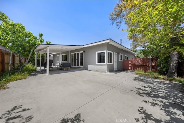 196 Coral View St, Monterey Park, CA 91755 - back of house featuring fence, a patio, and stucco siding