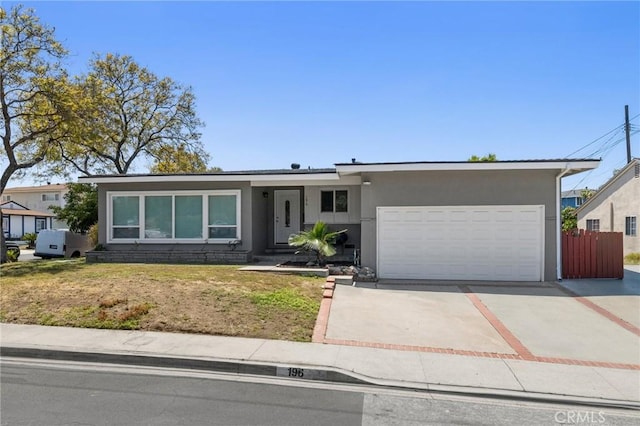 196 Coral View St, Monterey Park, CA 91755 - ranch-style home with driveway, stucco siding, and an attached garage
