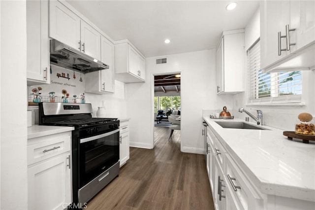 196 Coral View St, Monterey Park, CA 91755 - kitchen featuring stainless steel gas range, under cabinet range hood, a sink, recessed lighting, and white cabinetry