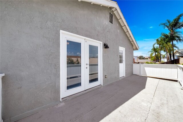 25735 Williamsburg Ct, Lake Forest, CA 92630 - view of patio / terrace with french doors and fence
