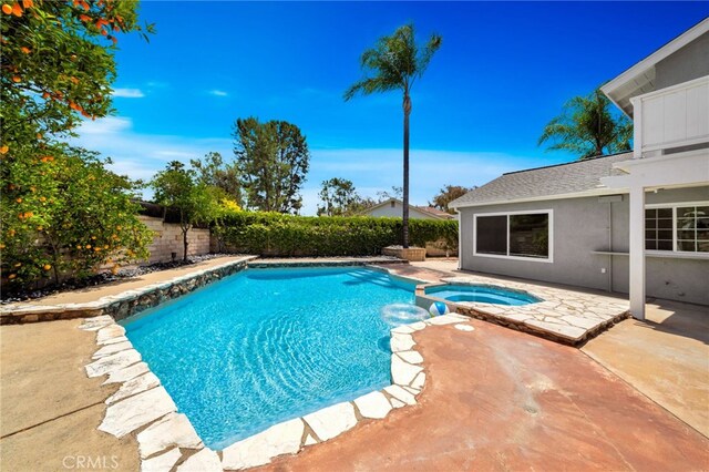 25735 Williamsburg Ct, Lake Forest, CA 92630 - view of pool featuring a patio, a fenced backyard, and a pool with connected hot tub