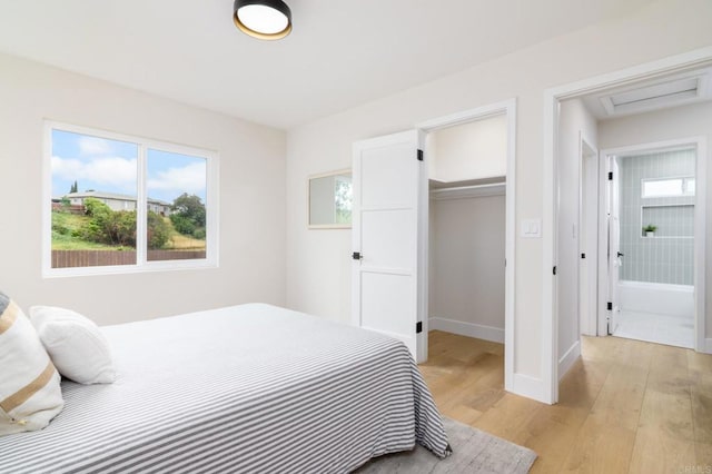 5157 Trinidad Way, San Diego, CA 92114 - bedroom with multiple windows, light wood-style floors, a closet, and baseboards