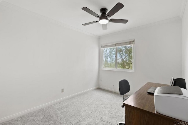 office space with a ceiling fan, baseboards, carpet floors, and ornamental molding