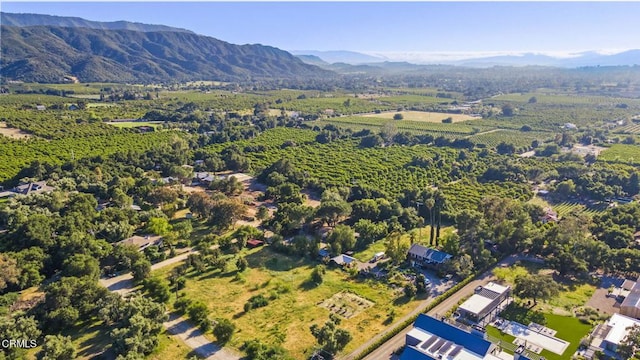 aerial view of property's location featuring mountains