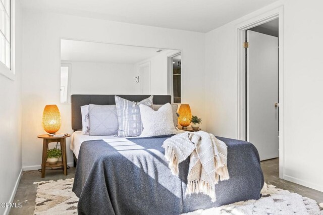 bedroom with baseboards