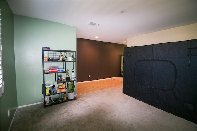 recreation room with carpet floors, baseboards, and recessed lighting