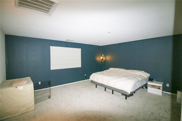 carpeted bedroom with baseboards