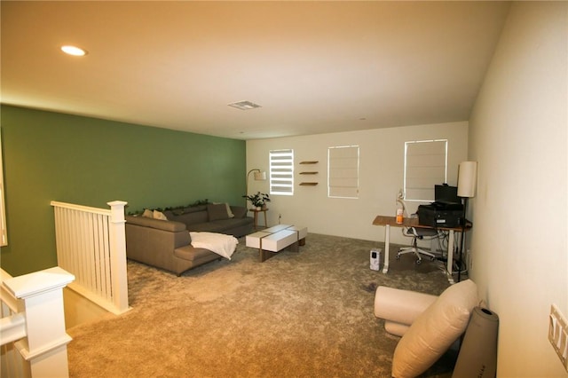 carpeted bedroom with recessed lighting