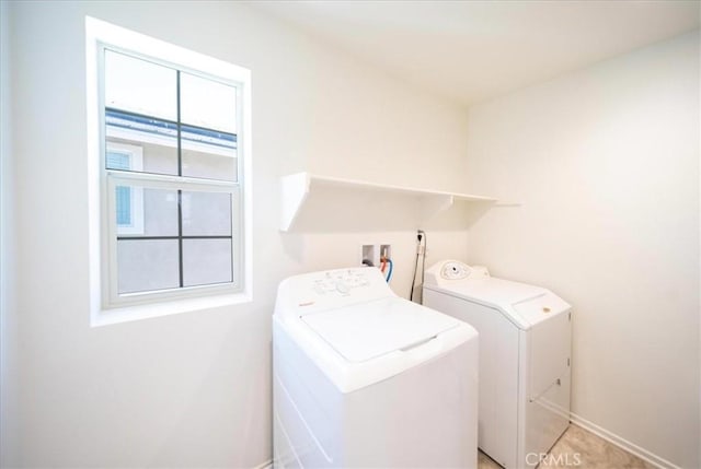 3409 Spring Wheat St, Perris, CA 92570 - laundry area with washer and clothes dryer and baseboards