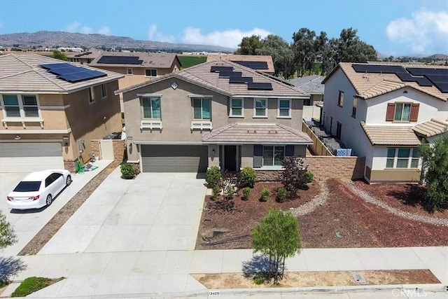 3409 Spring Wheat St, Perris, CA 92570 - view of front of house featuring a residential view, concrete driveway, stucco siding, and a garage