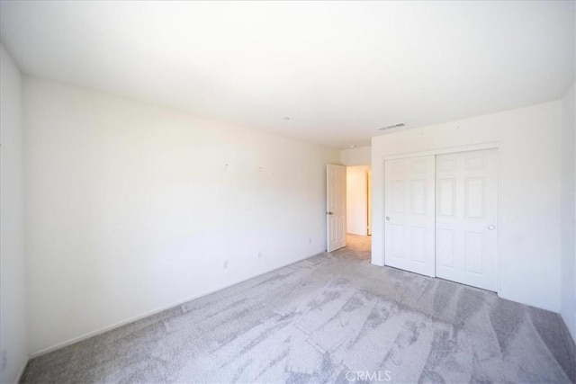 3409 Spring Wheat St, Perris, CA 92570 - unfurnished bedroom with carpet and a closet