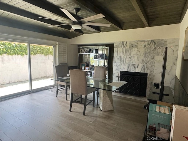 5134 Veronica St, Los Angeles, CA 90008 - dining area with healthy amount of natural light, a ceiling fan, wood finished floors, and wood ceiling