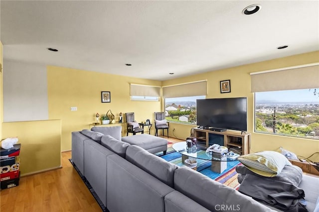 5134 Veronica St, Los Angeles, CA 90008 - living area with plenty of natural light, wood finished floors, and recessed lighting