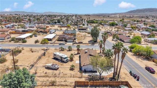 71854 El Paseo Dr Unit 29, Palms, CA 92277 - aerial view of residential area featuring a mountain backdrop