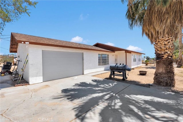 71854 El Paseo Dr Unit 29, Palms, CA 92277 - single story home featuring a garage, stucco siding, and driveway