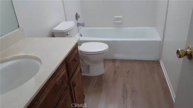 73601 Sun Valley Dr Unit 29, Palms, CA 92277 - full bathroom with wood finished floors, toilet, and vanity