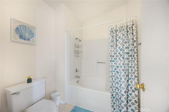 27559 Avenida Interno, Menifee, CA 92585 - bathroom featuring toilet, lofted ceiling, shower / bath combo with shower curtain, tile patterned floors, and baseboards