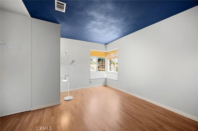 27559 Avenida Interno, Menifee, CA 92585 - unfurnished bedroom with wood finished floors and baseboards