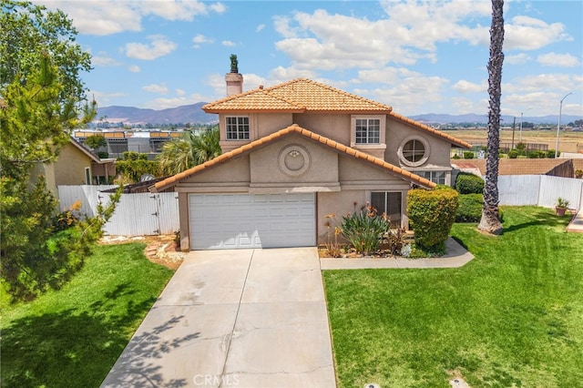 27559 Avenida Interno, Menifee, CA 92585 - mediterranean / spanish home with a mountain view, a chimney, driveway, an attached garage, and stucco siding