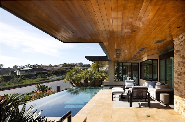 2526 Riviera Dr, Laguna Beach, CA 92651 - view of pool with a patio, an outdoor hangout area, and an infinity pool