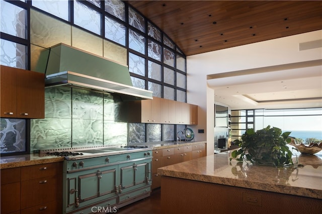 2526 Riviera Dr, Laguna Beach, CA 92651 - kitchen featuring wall chimney exhaust hood, decorative backsplash, plenty of natural light, stone counters, and wood ceiling