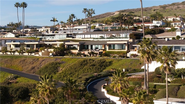2526 Riviera Dr, Laguna Beach, CA 92651 - aerial view of property and surrounding area featuring a mountain backdrop and nearby suburban area