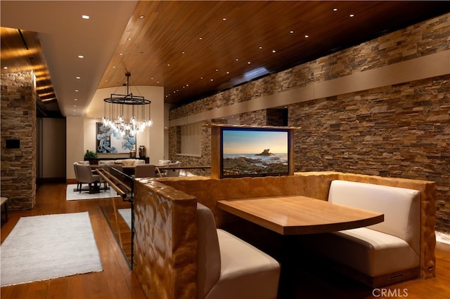 2526 Riviera Dr, Laguna Beach, CA 92651 - bar with a chandelier, wood finished floors, wooden ceiling, and hanging light fixtures
