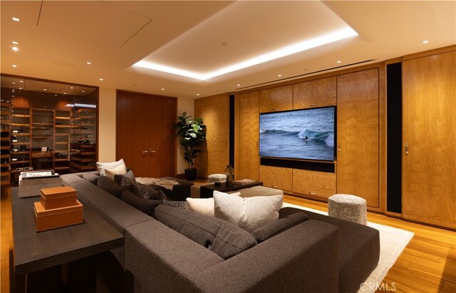 2526 Riviera Dr, Laguna Beach, CA 92651 - home theater room with wood finished floors, a tray ceiling, and recessed lighting