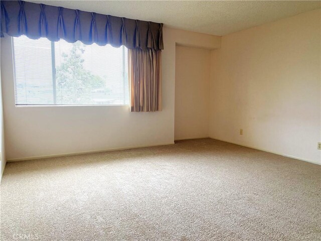 1740 Silver Maple Dr, La Habra, CA 90631 - unfurnished room featuring carpet flooring and a textured ceiling