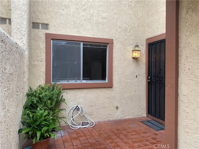 1740 Silver Maple Dr, La Habra, CA 90631 - view of exterior entry with stucco siding
