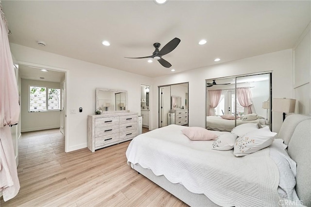 3004 Via Buena Vis Unit C, Laguna Woods, CA 92637 - bedroom with light wood finished floors, recessed lighting, ceiling fan, baseboards, and ensuite bath