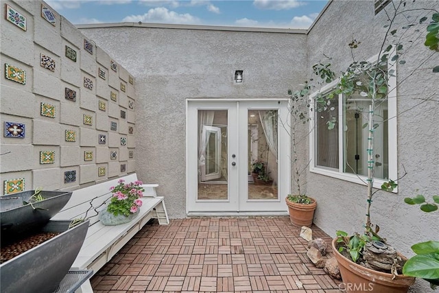 3004 Via Buena Vis Unit C, Laguna Woods, CA 92637 - property entrance featuring stucco siding and french doors