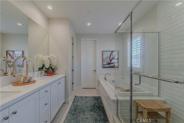 bathroom with tile patterned floors, a garden tub, recessed lighting, double vanity, and a shower with shower door