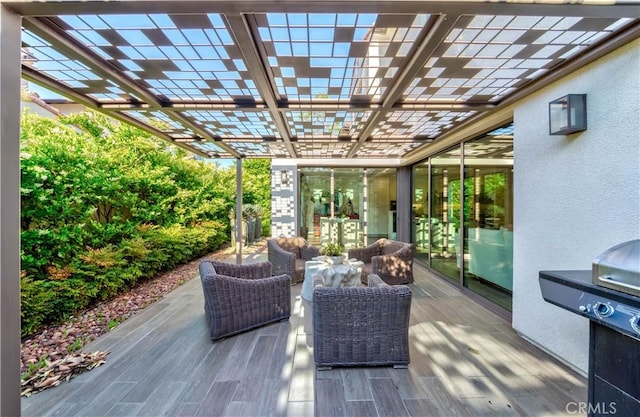 view of patio / terrace with an outdoor living space and a pergola